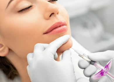 Patient receiving chin and jawline dermal filler treatment illustrating best jawline filler options for facial contouring