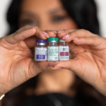 Injector comparing Dysport and Botox wrinkle relaxer vials at a San Antonio med spa